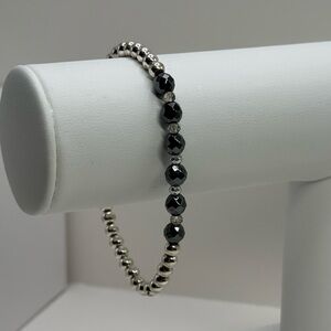 Tocara stainless steel stretch Bracelet with dark Faceted Accents